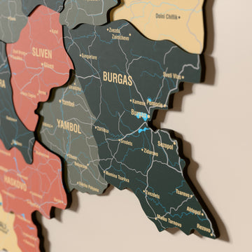 Close-up of the Sage Bulgaria wooden wall map with layered regions and printed names