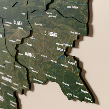 Close-up of the Satellite Bulgaria wooden wall map with layered regions and printed names
