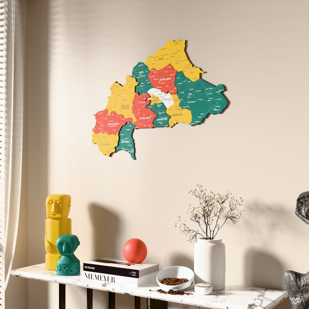 Flag colored Burkina Faso wooden wall map beside a sheer curtain, angled view
