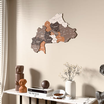 Soil Burkina Faso wooden wall map beside a sheer curtain, angled view