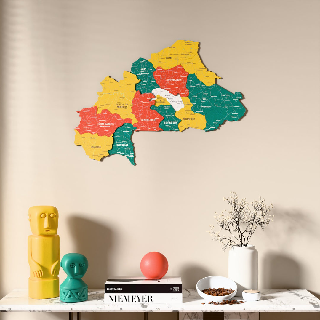 Flag colored Burkina Faso wooden wall map above a marble console, front view
