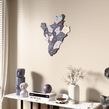 Nimbus Burundi wooden wall map beside a sheer curtain, angled view