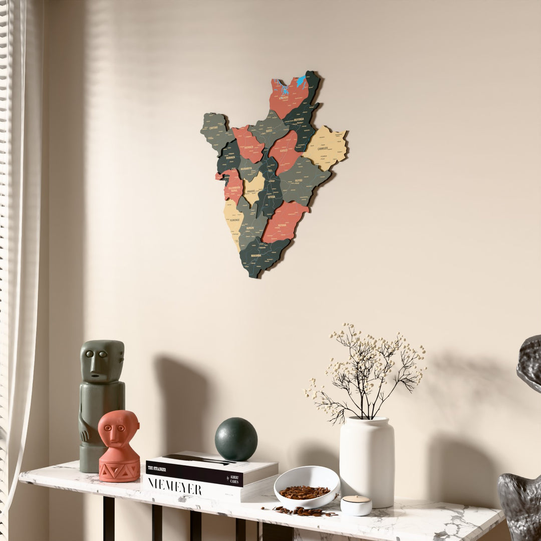 Sage Burundi wooden wall map beside a sheer curtain, angled view
