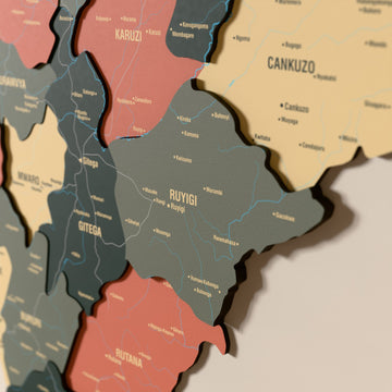 Close-up of the Sage Burundi wooden wall map with layered regions and printed names