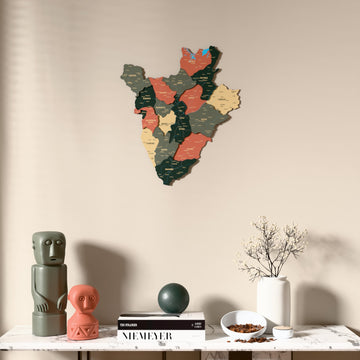 Sage Burundi wooden wall map above a marble console, front view
