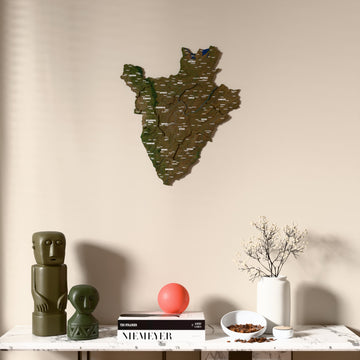 Satellite Burundi wooden wall map above a marble console, front view