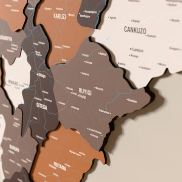 Close-up of the Soil Burundi wooden wall map with layered regions and printed names