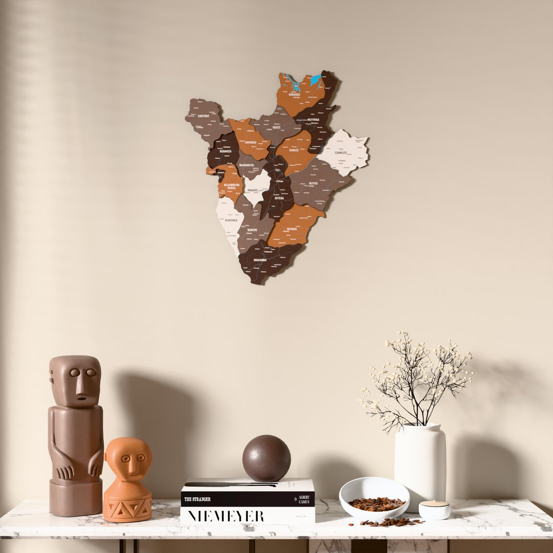 Soil Burundi wooden wall map above a marble console, front view