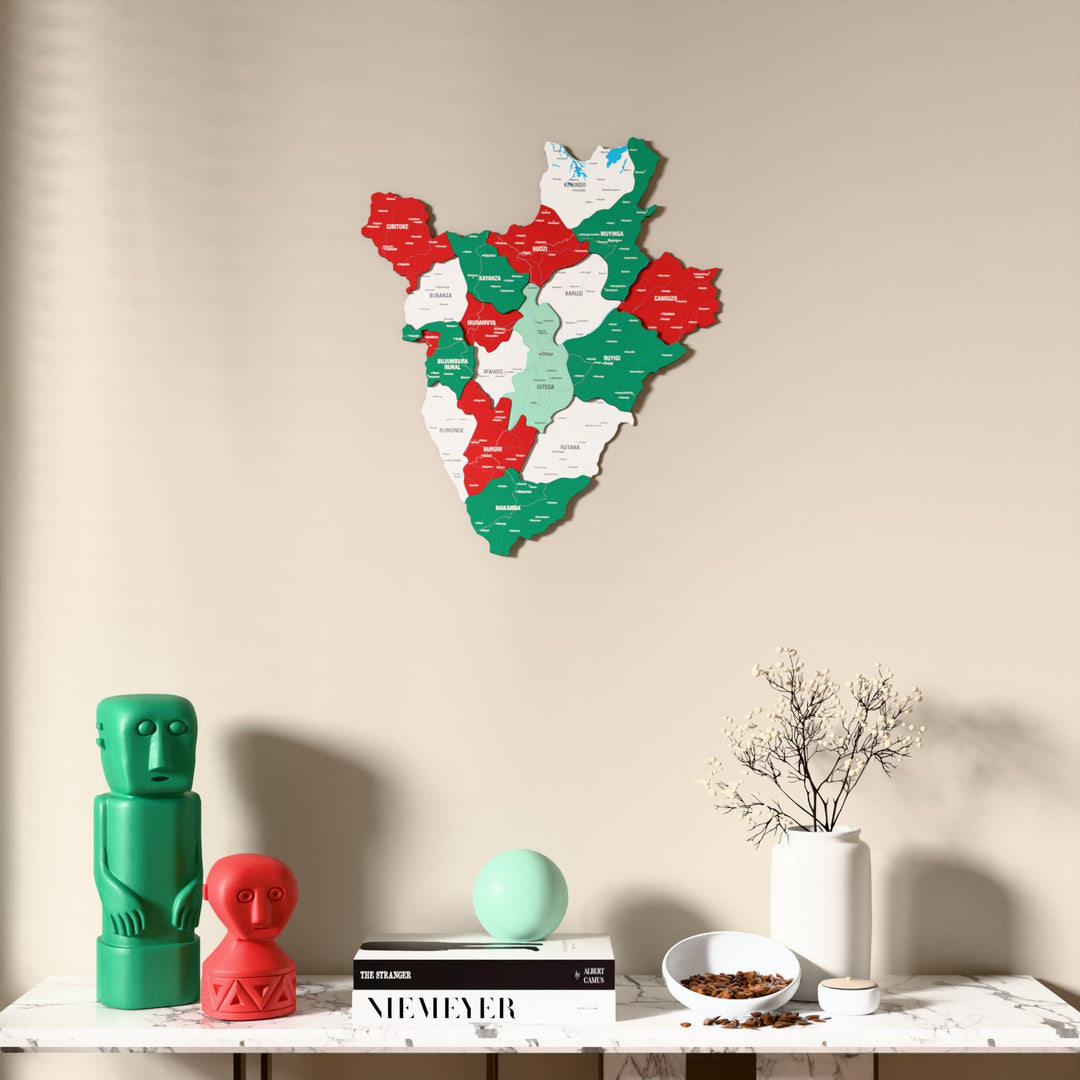Flag colored Burundi wooden wall map above a marble console, front view