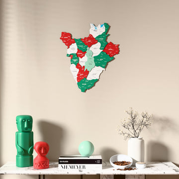 Flag colored Burundi wooden wall map above a marble console, front view