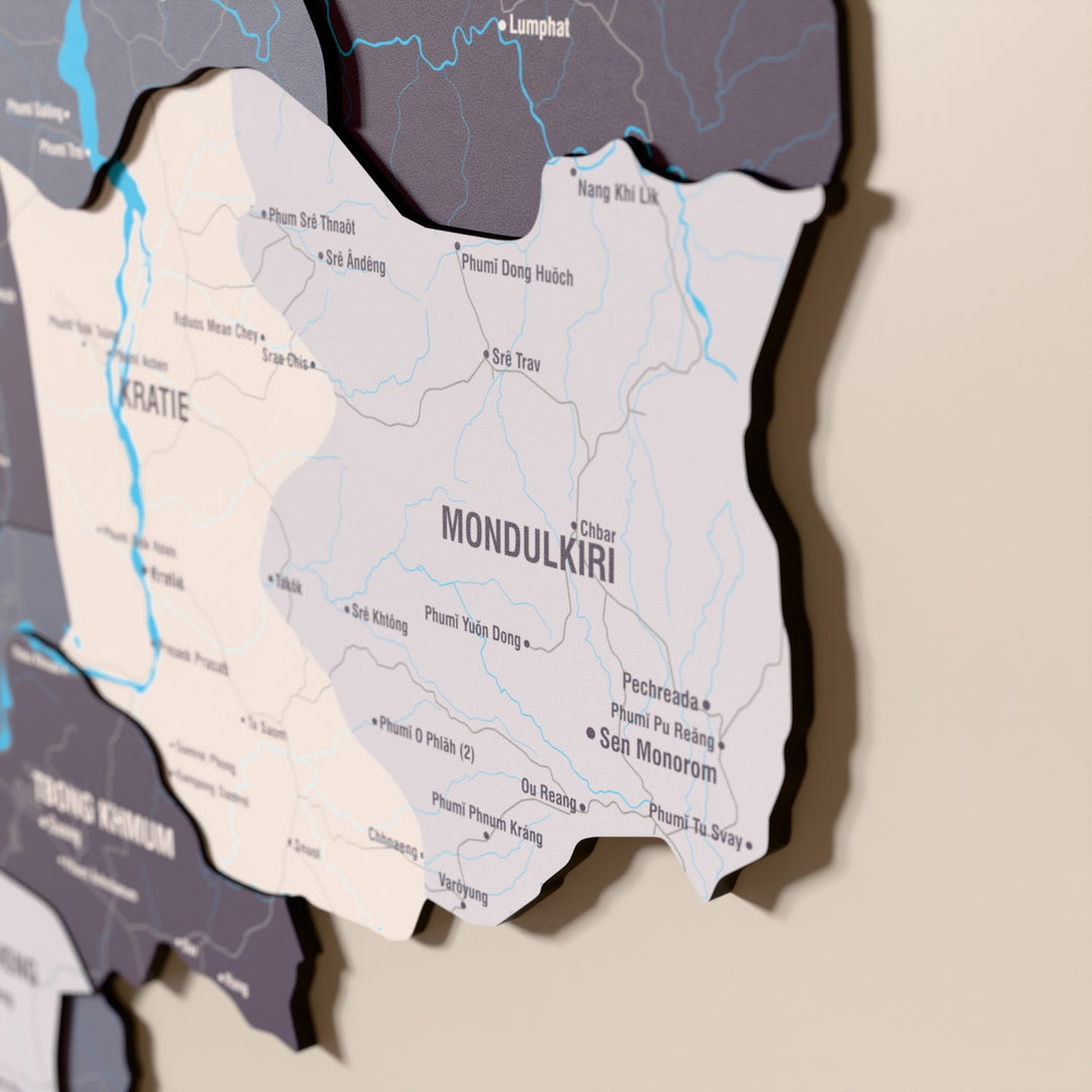 Close-up of the Nimbus Cambodia wooden wall map with layered regions and printed names