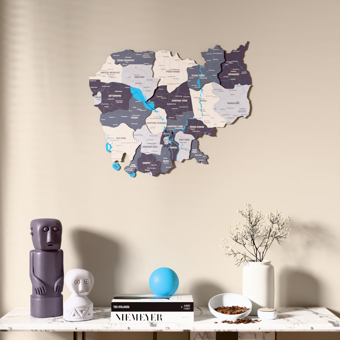 Nimbus Cambodia wooden wall map above a marble console, front view
