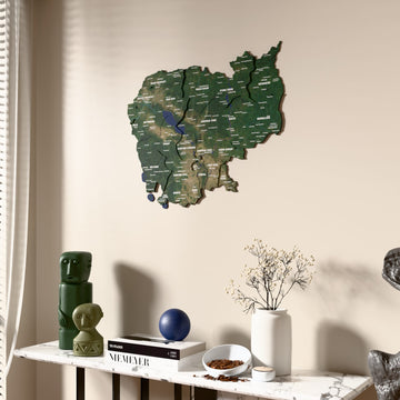 Satellite Cambodia wooden wall map beside a sheer curtain, angled view