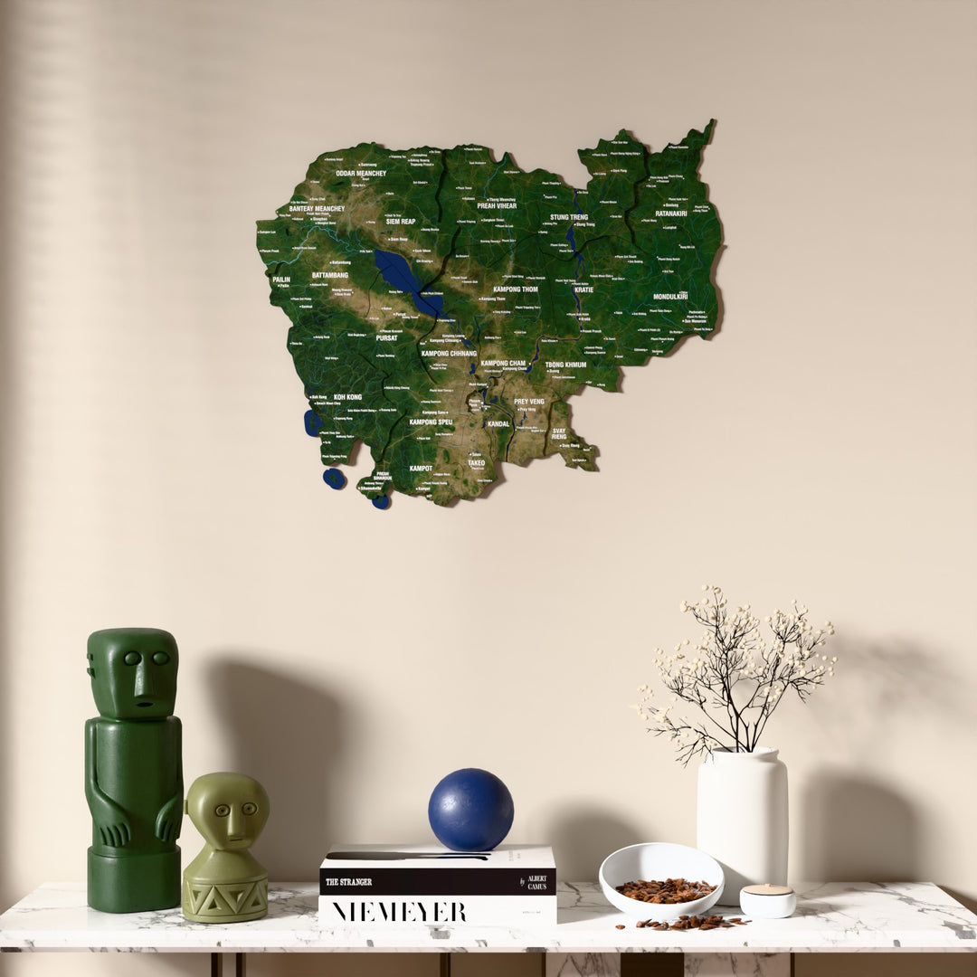 Satellite Cambodia wooden wall map above a marble console, front view