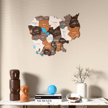 Soil Cambodia wooden wall map above a marble console, front view