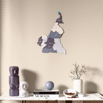 Nimbus Cameroon wooden wall map above a marble console, front view