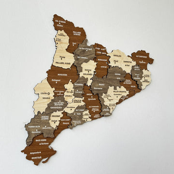 Large wooden Catalonia map on a white wall, close angled view of the full map