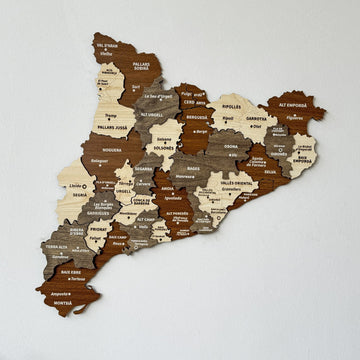 Wooden Catalonia wall map with comarca names in brown, cream and gray layers, front view