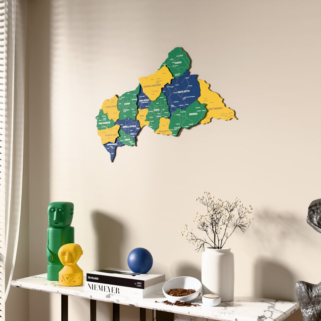 Flag colored Central African Republic wooden wall map beside a sheer curtain, angled view