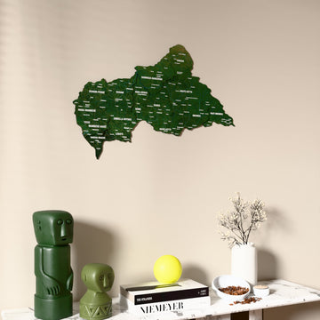 Satellite Central African Republic wooden wall map on a beige wall above a console with figurines