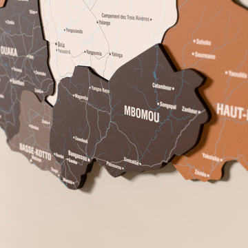 Close-up of the Soil Central African Republic wooden wall map with layered regions and printed names