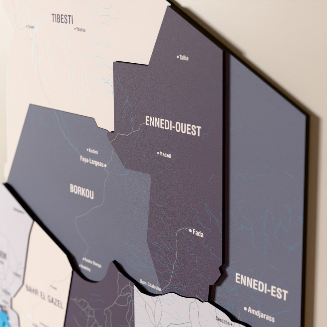Close-up of the Nimbus Chad wooden wall map with layered regions and printed names