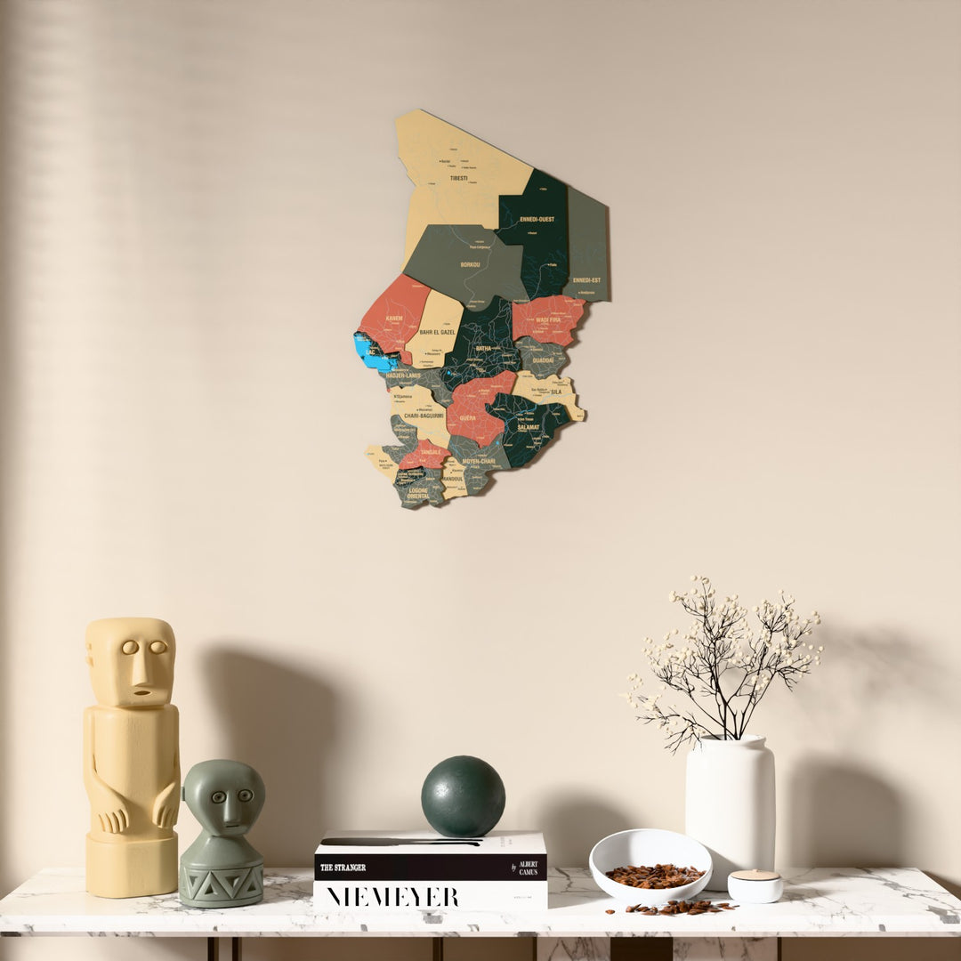 Sage Chad wooden wall map above a marble console, front view