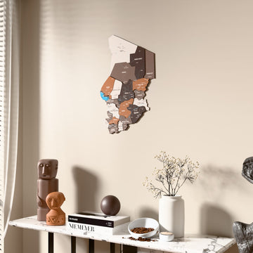 Soil Chad wooden wall map beside a sheer curtain, angled view