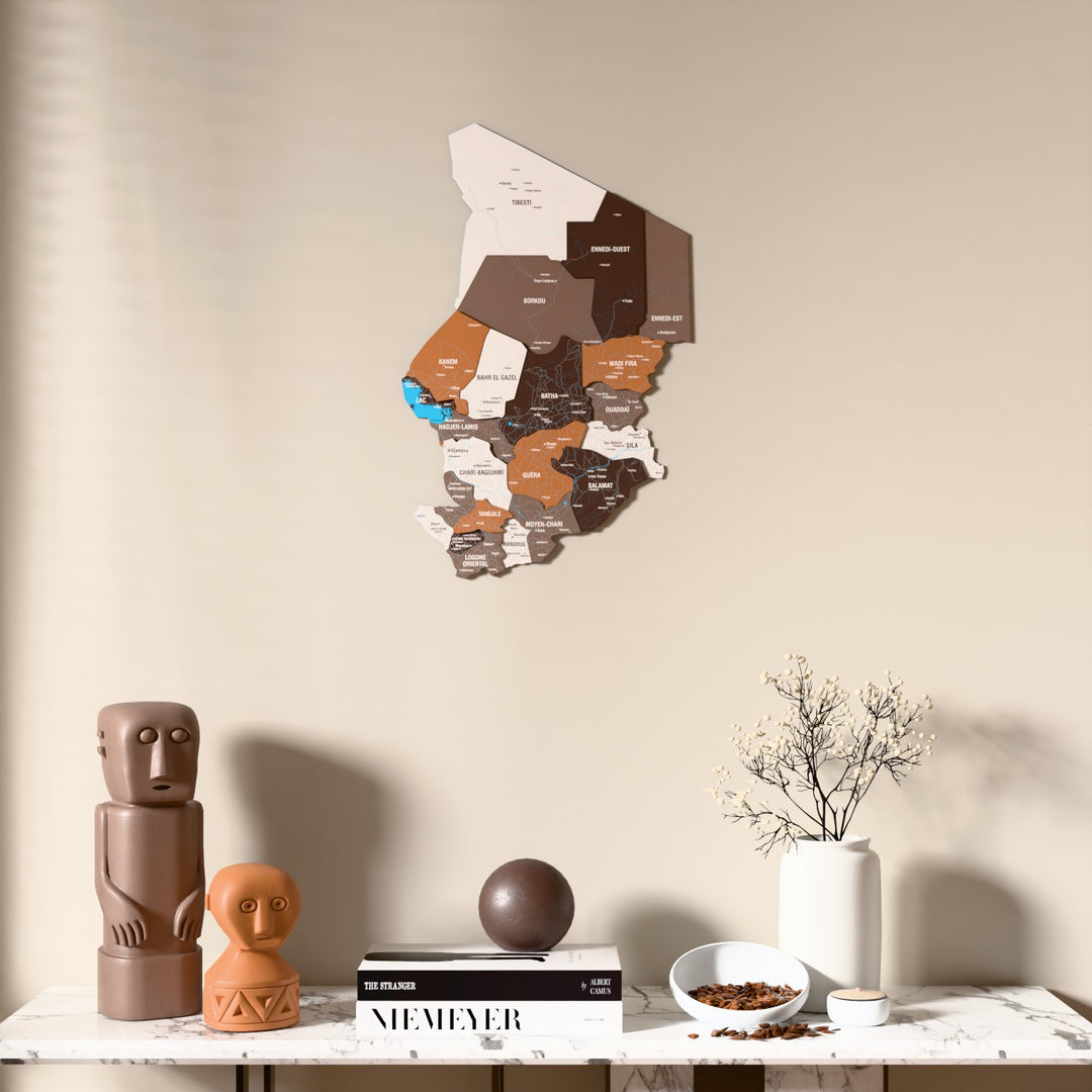 Soil Chad wooden wall map above a marble console, front view