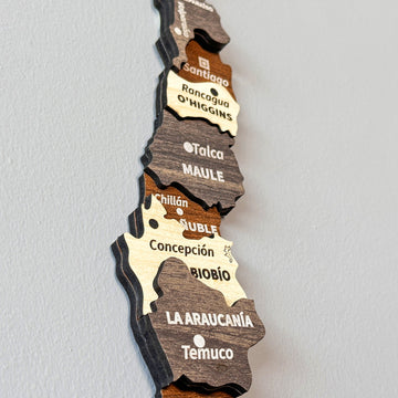 Close-up of the Santiago, Maule, Biobío and La Araucanía layers on the wooden Chile map