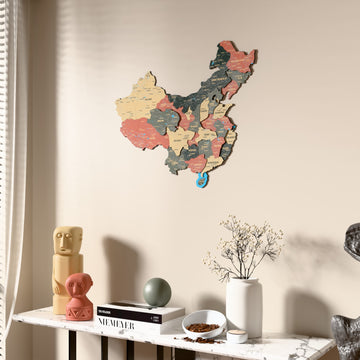 Sage China wooden wall map beside a sheer curtain, angled view