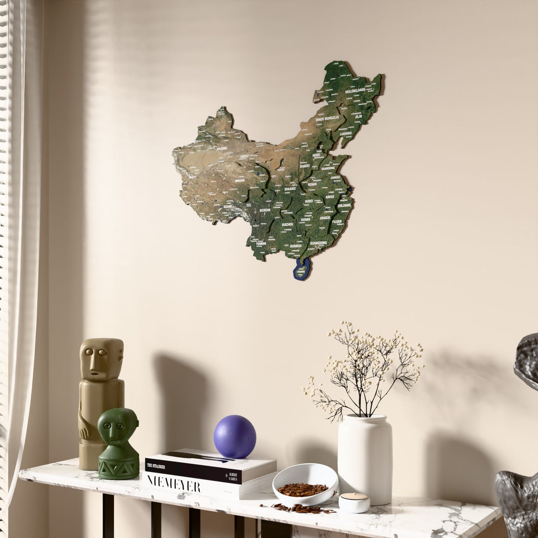 Satellite China wooden wall map beside a sheer curtain, angled view