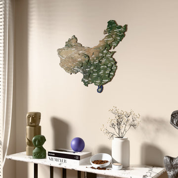 Satellite China wooden wall map beside a sheer curtain, angled view