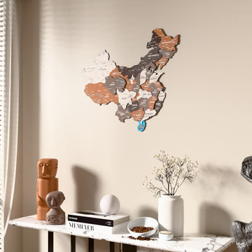 Soil China wooden wall map beside a sheer curtain, angled view