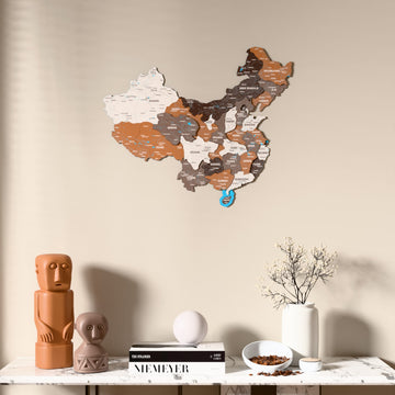 Soil China wooden wall map above a marble console, front view