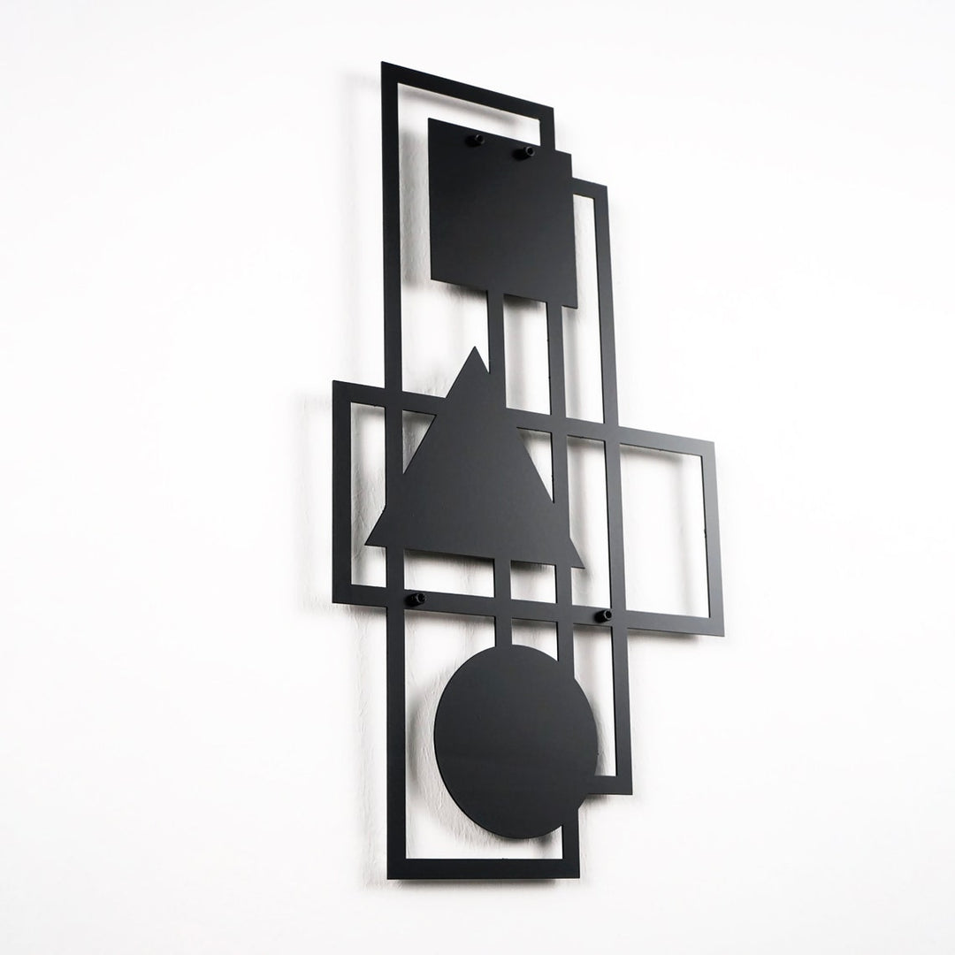 Black geometric metal wall art with square, triangle and circle, side angle