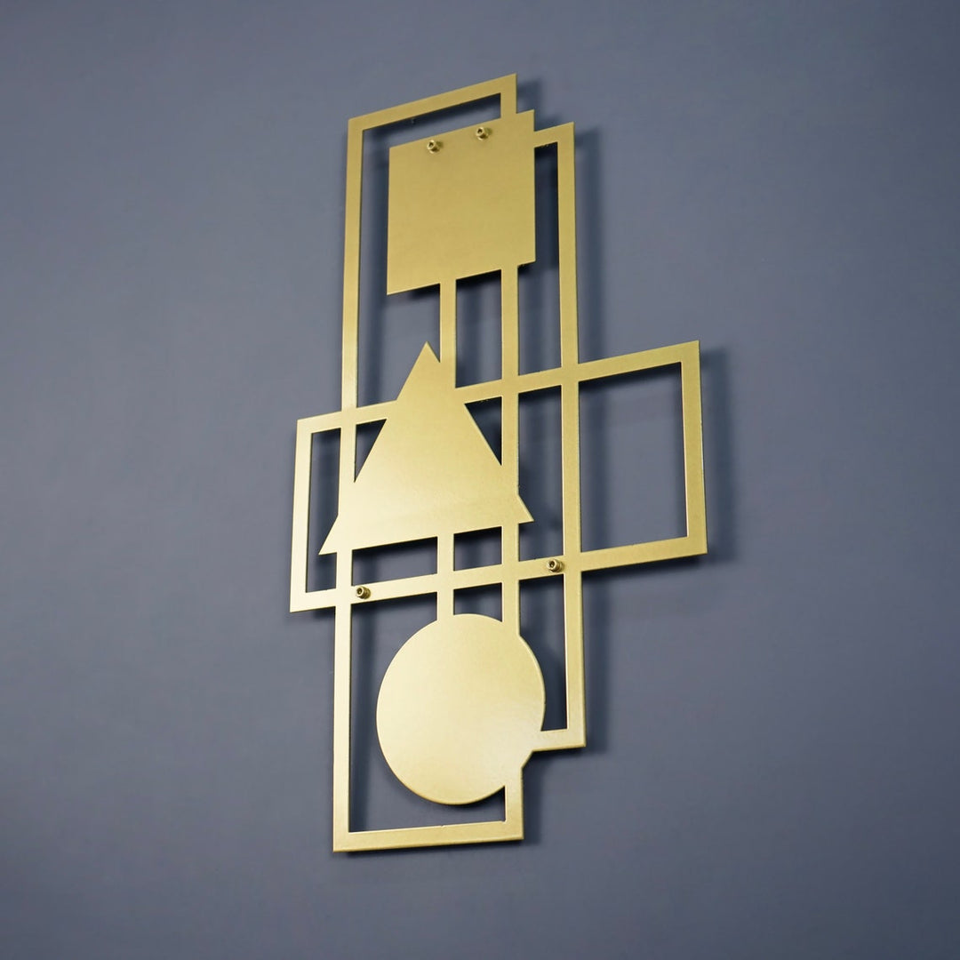 Gold geometric metal wall art, close view of the frames and shapes