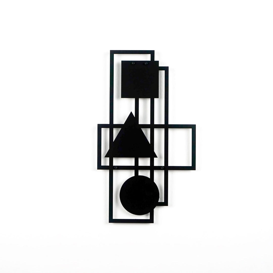 Black geometric metal wall art on a white wall, front view
