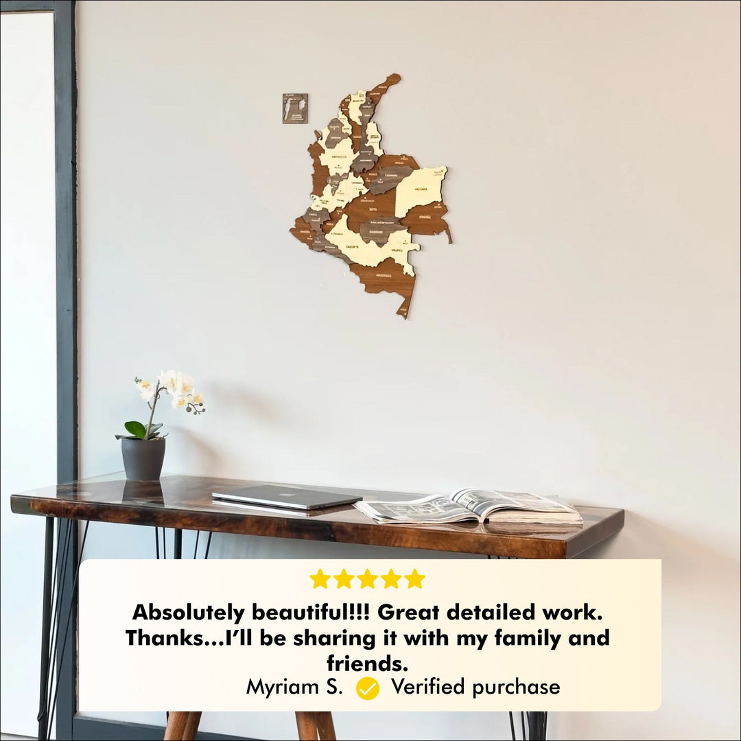 Colombia wooden map above a resin edge desk with a five-star customer review about the detailed work