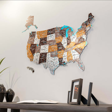 Soil UV-printed metal USA map with Alaska and Hawaii inset pieces, angled view above a shelf and framed photos