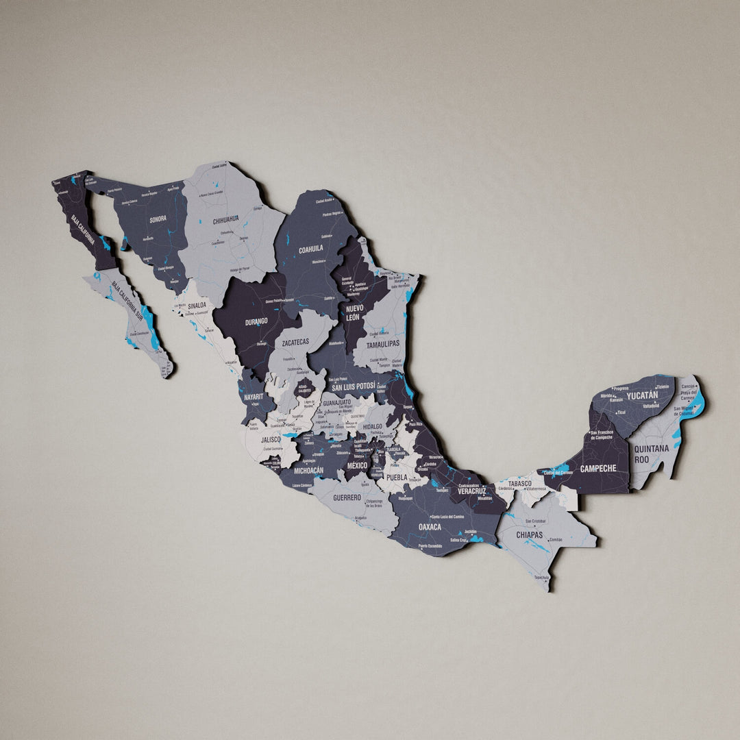 Nimbus Mexico wooden wall map in slate gray and purple tones on a beige wall, angled view showing the layered pieces