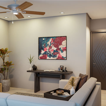 Wooden Europe map with rivers in Crimson, in a living room with a sofa and ceiling fan