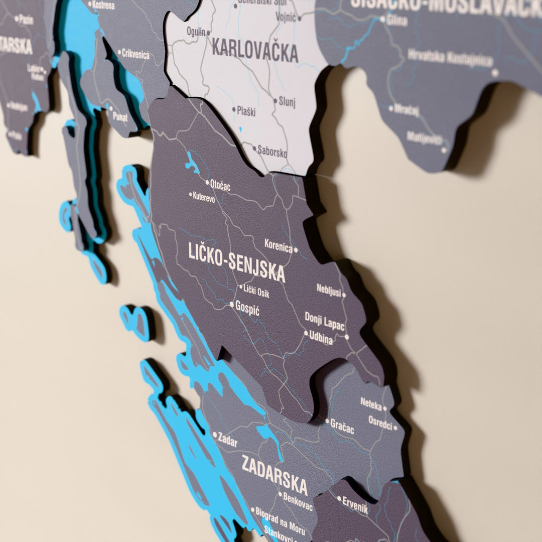 Close-up of the Nimbus Croatia wooden wall map with layered regions and printed names