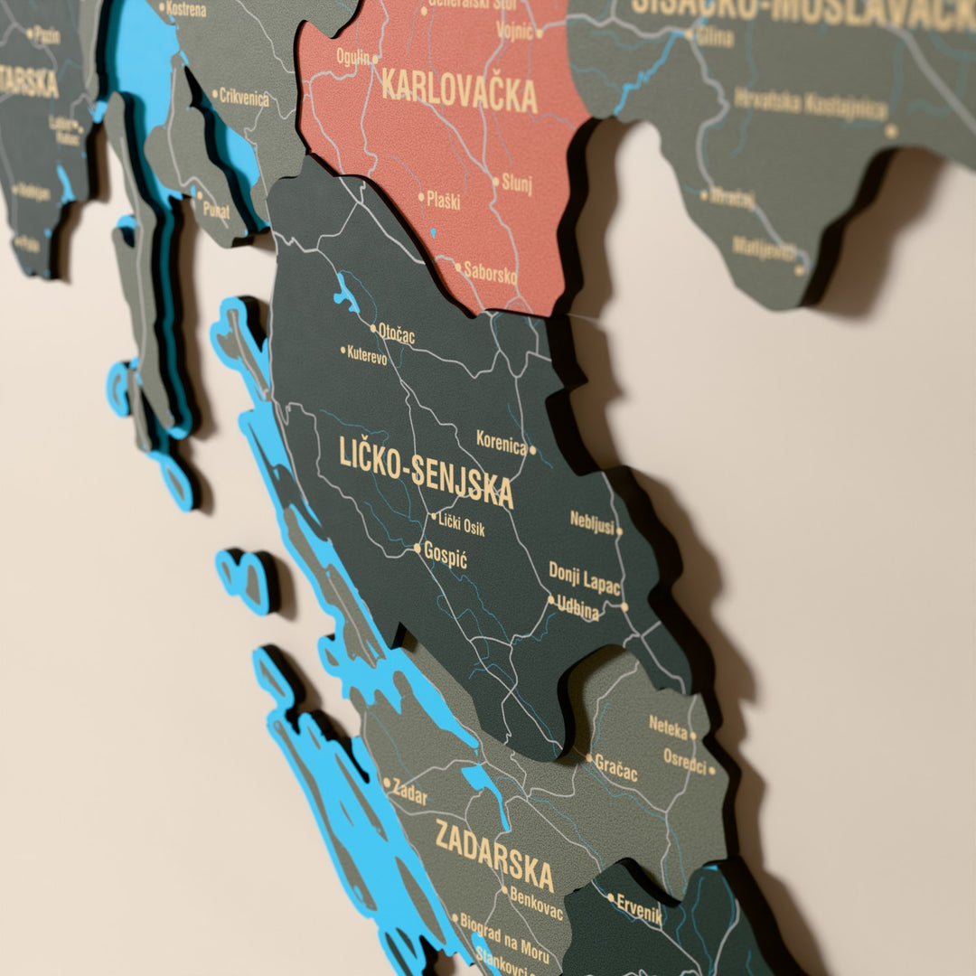 Close-up of the Sage Croatia wooden wall map with layered regions and printed names