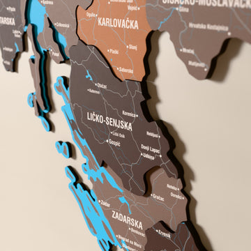 Close-up of the Soil Croatia wooden wall map with layered regions and printed names