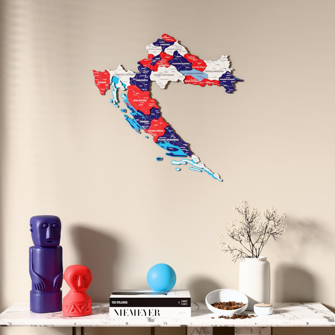 Flag colored Croatia wooden wall map above a marble console, front view