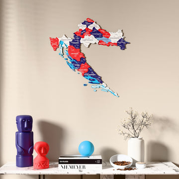 Flag colored Croatia wooden wall map above a marble console, front view