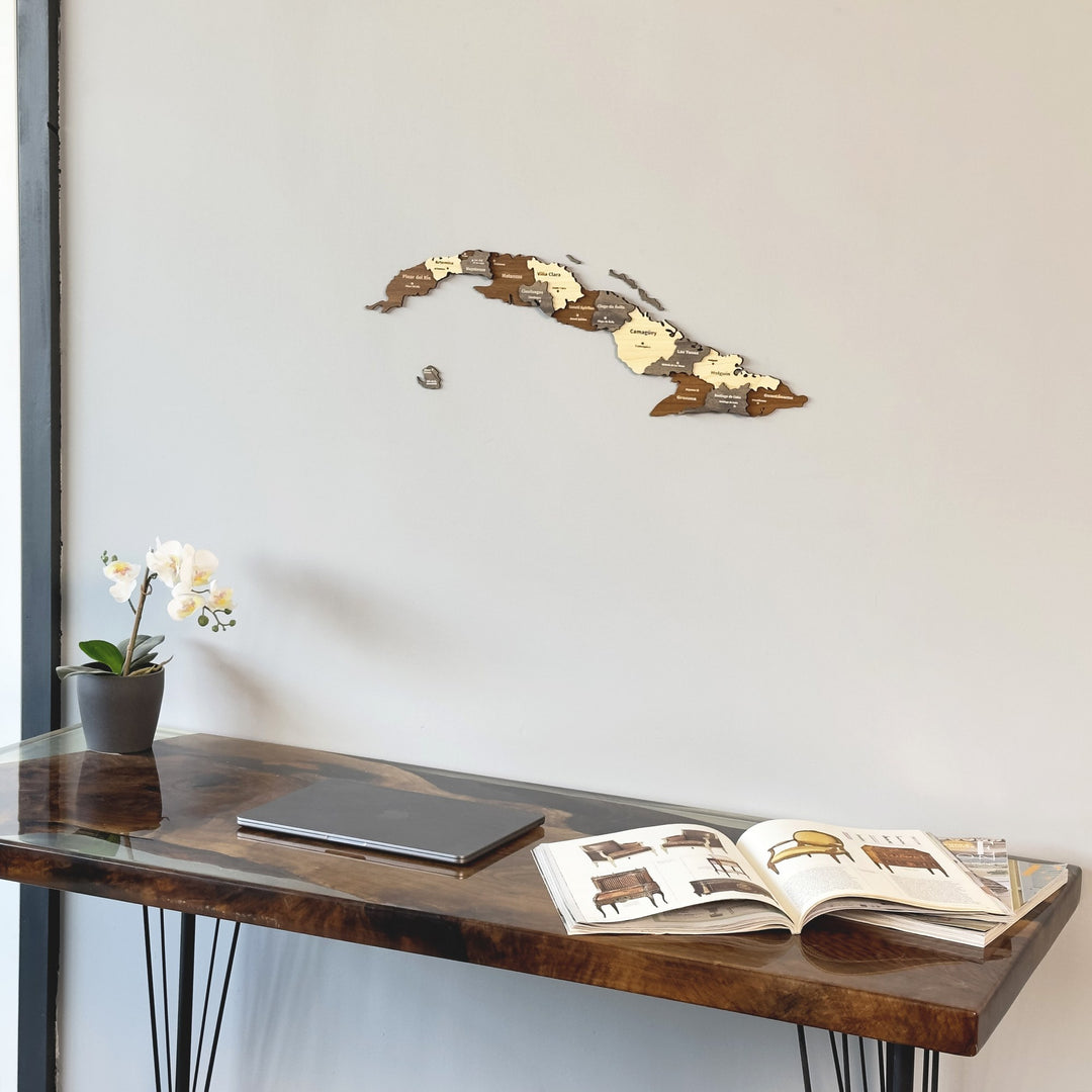 Cuba wooden wall map close view above a resin-topped desk