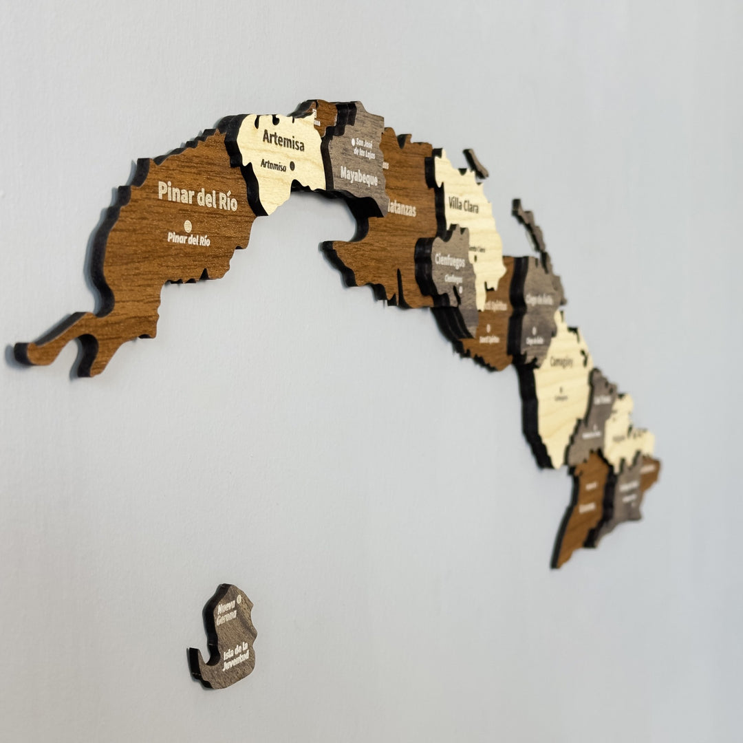 Angled close-up of the wooden Cuba map showing Pinar del Rio, Artemisa, Villa Clara and Camaguey layers