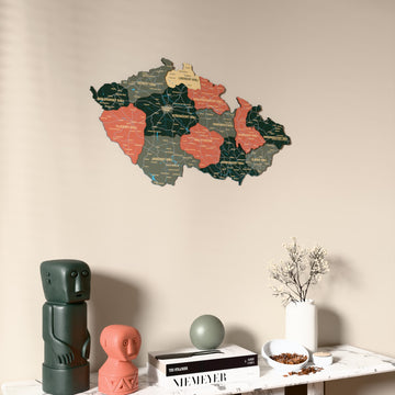 Sage Czech Republic wooden wall map on a beige wall above a console with figurines